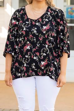 The love we have for this top is rare and special! We love the neutral black color that can be paired with so many bottoms! The floral pattern is perfect for warm weather and the open tie back is so chic! Style this with some white skinnies and your best sandals for a stylish look! 100% Polyester White Skinnies, Model Fits, Tie Backs, Tie Back, Warm Weather, Chic Style, Floral Tops, Black Color, Floral Pattern