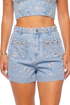 These high waisted denim shorts feature hand beaded rhinestone and pearl detailing throughout. Zip fly, button fastening Front patch pockets 100% cotton Dry clean only High Waisted Denim Shorts, High Waisted Shorts Denim, High Waisted Denim, Hand Beading, Patch Pocket, Denim Shorts, Dry Clean, High Waisted