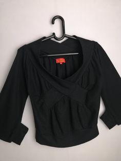 "VIVIENNE WESTWOOD women's wool jumper, made in Italy Very good condition Size tagged M (please check measurements) Composition: 100% wool Measurements: Shoulder to shoulder - 16.9\" / 43 cm Pit to pit - 18.5\" / 47 cm Back length from neck - 20.9\" / 53 cm * All measurements are taken with the garment laying flat #693 We are ready to make a discount when buying more than one item. Let us know what interests you and give you the best price for this deal. Payment & Shipping: - Accept PayPal o Wool V-neck Top For Winter, Wool V-neck Top For Fall, Wool V-neck Workwear Tops, Black Wool Long Sleeve Tops, V-neck Wool Tops For Workwear, Vintage Long Sleeve Wool Top, Vintage Wool Long Sleeve Tops, Vivienne Westwood Vintage, Sweater Y2k