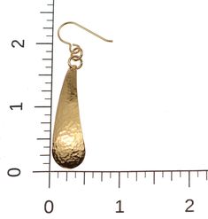 Long, slender and elegant, the Hammered Bronze Teardrop Earrings are the perfect choice for anyone who wants to make a statement with their earrings without being too dramatic. They feature a solid metal body that has a slight curve in it, offering plenty of depth. The earrings have a solid metal body that is elegantly hammered to add plenty of multifaceted detailing sure to help show off its shiny finish, especially in the light. They are handcrafted out of top-quality bronze metal that is able Elegant Hammered Dangle Teardrop Earrings, Elegant Hammered Teardrop Earrings, Elegant Hammered Teardrop Dangle Earrings, Brass Long Drop Teardrop Earrings, Elegant Hammered Brass Teardrop Earrings, Hammered Teardrop Earrings For Formal Occasions, Elegant Hammered Teardrop Earrings For Gift, Metal Long Drop Teardrop Earrings For Formal Occasions, Formal Long Drop Teardrop Metal Earrings