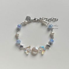 How To Make A Chain Bracelet, Handmade Pearl Crystal Bracelet In Silver, Handmade Silver Pearl Crystal Bracelet, Diy Chain Bracelets, Cute Bracelet Ideas Bead, Blue Bracelet Beads, Blue And White Bracelet, Blue Bead Bracelet, Blue Bracelets