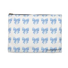 Gorgeous miniature blue bows adorn this accessory pouch. Sophisticated, chic, and luxurious, our pouches come in various sizes and serve a multitude of purposes. Whether as a stylish pencil case or a glamorous cosmetic travel bag, they are made from durable materials and feature a convenient zipper closure. .: 100% Polyester.: Machine Washable on Gentle Cycle.: Flat corners .: Non-woven white or black laminate inside.: Assembled in the USA from globally sourced parts .: Multiple sizes: Small (Length, in 8.35, Height , in 5.98) Large (Length, in 11.81 Height , in 8.35) Blue Zipper Pouch Cosmetic Clutch Bag, Blue Zipper Clutch Cosmetic Bag, Blue Clutch Cosmetic Bag With Zipper, Blue Zipper Pouch Cosmetic Bag Gift, Chic Zipper Pouch As Gift, Chic Pouch As Gift, Blue Pouch Pencil Case For Gift, Blue Pouch Pencil Case As Gift, Blue Pencil Case Pouch For Gift