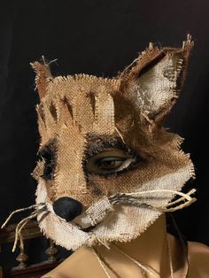 This unique fox mask is made of hand painted burlap and thick eco-felt.  Fun for Halloween, masquerades and costume parties, parades, photo shoots, and movie props. * Hand painted: waterproof acrylic inks * Lightweight: eco-felt and burlap * Adjustable fit: cotton twill tape ties * Comfortable: lined with soft eco-felt * Free shipping to most places This mask is unique.  Your order will ship within three days. This mask is in the U.S. You can see through this mask.  Water resistant, but not wate Fox Masks, Crow Mask, Mask For Halloween, Painting Burlap, Bird Masks, Fox Mask, Mardi Gras Parade, Animal Masks, Adult Halloween Costumes