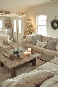 a living room filled with furniture and a christmas tree