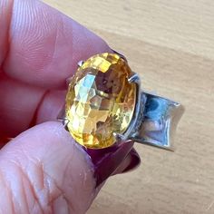 Gorgeous Modernist Looking Vintage Citrine Ring. The Stone Is Gorgeous,Approx. 14x10 Mm In Size , Checkerboard Cut And The Band Is 8mm Wide.The Ring Is Size 7.5 On My Ring Mandrel, Thick, Beautiful, Well Made Piece !!! Oval Citrine Ring With Large Stone, Oval Gemstone Rings In Modernist Style, Modernist Oval Gemstone Rings, Oval Cabochon Citrine Rings, Faceted Oval Citrine Jewelry, Handmade Modernist Oval Rings, Luxury Oval Faceted Topaz Ring, Luxury Faceted Oval Topaz Ring, Yellow Oval Topaz Ring With Polished Finish