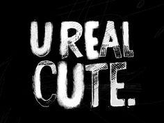 the words'real cute'are written in white on a black background with lines