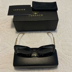 Brand New Versace Sunglasses Black And Gold Comes With Case And Dust Bag. Elegant Tinted Sunglasses For Everyday Use, Elegant Tinted Lenses Sunglasses For Everyday Use, Luxury Black Sunglasses For Travel, Elegant Square Frame Sunglasses For Travel, Classic Rectangular Sunglasses For Evening, Chic Rectangular Sunglasses For Travel, Elegant Rectangular Sunglasses With Mirrored Lenses, Black Tinted Sunglasses For Everyday Use, Luxury Polarized Sunglasses For Travel