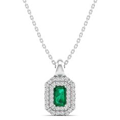 This exquisite emerald and diamond pendant features a stunning pear-shaped emerald surrounded by a halo of sparkling diamonds. The vibrant green of the emerald combined with the brilliance of the diamonds creates a timeless and elegant piece that will surely make a statement. Metal: 14K Gold Setting Type: Prong Rhodium Finish: Yes, on White Gold Gemstone Details: Gemstone: Emerald Shape: Emerald Cut Average Dimensions: 5.00 x 3.00 MM Quantity: 01 Average Cut: Very Good Average Color: Medium to D May Birthstone Emerald Necklace With Halo Setting, Green Emerald Necklace With Halo Setting For May Birthstone, May Birthstone Green Emerald Necklace With Halo Setting, Green Emerald Necklace With Diamond Halo Setting, Dance Jewelry, Double Halo, Birthstone Gifts, Ring Pendant Necklace, Vibrant Green