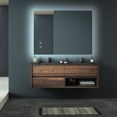 a bathroom with two sinks and a large mirror