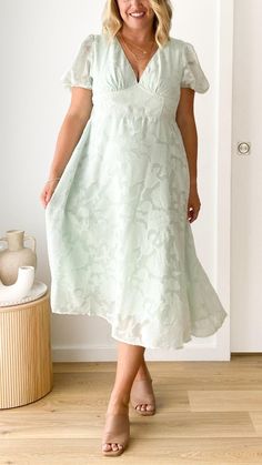 Step into elegance with our Mint Lace V-Neck Midi Dress. Featuring a partially elasticated waistline, and a flattering V-neckline, this dress offers both style and comfort. Lined and true to size for the perfect fit. Flattering V-neck Spring Dresses, Elegant V-neck Midi Dress With Elastic Waistband, Feminine V-neck Flowy Midi Dress, V-neck Midi Dress With Elastic Waistband For Brunch, Feminine V-neck Dress With Elastic Waistband, V-neck Dress With Elastic Waistband For Daywear, Green Sleeveless Dress With Elastic Waistband, Flowy V-neck Midi Dress For Garden Party, V-neck Midi Dress With Elastic Waistband For Day Out