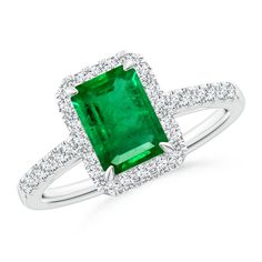 Mounted in a claw setting is an emerald-cut emerald that catches attention with its glorious green hue. Diamond accents surround the gem in a sparkling halo and embellish the shank. This 14k white gold ring exudes sophisticated charm. Girls Ring, Gold For Women, Cute Engagement Rings, Diamond Halo Ring, Ring With Diamond, Gift For Her Birthday, May Birthstone, Emerald Engagement, Rings For Girls