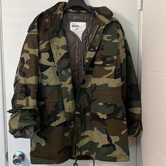 Brand New, Never Worn. No Wear Or Tear. Great Quality. Camouflage Jacket With Hoodie In Zip Collar, Waist Drawstrings, Snap And Zip Closure, Detachable Insulated Lining (Can Be Worn Separately). Can Be Worn In Multiple Seasons. Men’s Size Medium For Baggy Look. Fits Like A Women’s Large Or Xl, Depending On Your Shape. Can Be Worn As Shown In Last Picture (For Style Purposes Only). Measurements: Men’s Medium Chest. 25.0 Sleeve 32.50 Back 32.50 Camouflage Utility Jacket For Winter Outdoors, Camouflage Long Sleeve Outerwear For Cold Weather, Camouflage Hooded Combat Outerwear, Camouflage Outerwear For Cold Fall Weather, Camouflage Utility Outerwear For Outdoor, Camouflage Outdoor Outerwear With Detachable Hood, Utility Camouflage Outdoor Outerwear, Casual Camouflage Outerwear For Hunting, Winter Camouflage Utility Jacket With Pockets