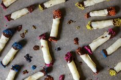 some kind of food that is laying on a table with sprinkles and other things