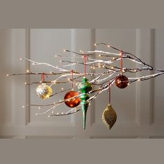 a christmas tree with ornaments hanging from it