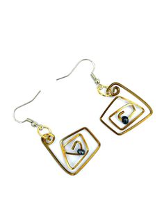 A pair of Earrings of Hand Formed square shape Brass Wire. A Freeform Geometric design, with a small shiny black round Glass Bead in the center. These lightweight Modern look Unique Earrings are hung on Fish Hooks of Gold Plated 925 Silver. Gold Wire Dangle Earrings, Gold Wire Earrings For Pierced Ears, Pierced Dangle Earrings With Wire, Gold Freeform Earrings As Gift, Gold Freeform Earrings For Gift, Gold Wrap Earrings With Ear Wire, Hand Forged Spiral Metal Earrings, Gold Hand Forged Wrap Earrings As Gift, Hand Forged Gold Wrap Earrings As Gift