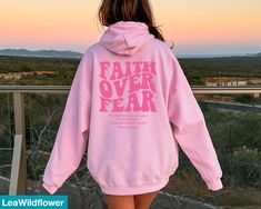 Looking for a christian bible verse hoodie ? Our faith over fear hoodie is the perfect gift for all! It's made of a soft comfortable blend of high-quality materials and is sure to last for years to come. It's perfect for wearing on a cold day, out for a hike, or just lounging around the house. ★Shipping This is a made to order item Our turn around time is 1 to 3 business days. If you need any item by a certain date, please message us and we'll see what we can do! ★Size This sweatshirt is unisex Bible Verse Aesthetic, Verse Aesthetic, Christian Sweatshirts, Aesthetic Christian, Jesus Sweatshirts, Christian Hoodies, Hoodie Aesthetic, Christian Sweatshirt, Faith Over Fear