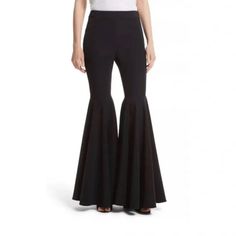 These Pants Are Literally A Game Changer! Featuring A Very Chic, Slim, Fit Through The Thighs, And Opening Into The Most Deliciously Dramatic Bell Bottom Flarethese Are The Pants You Wear When You Want To Be The Center Of Attention And Make An Entrance. Similar To The Saint Laurent Flare Trousers That Are Priced At $2000, These Milly Pants Are A Steal. Never Before Worn And With Tags Still Attached, These Pants Are In Perfect Condition And Ready For A New Home! Size 4 And Size 8 Are Available. P Spring Party Wide-leg Dress Pants, Black Flare Dress Pants For Evening, Chic Wide Leg Pants For Date Night, Fitted Dress Pants For Night Out, Elegant Black Flare Bottoms, Chic Fitted Flare Wide Leg Pants, Fitted Flare Dress Pants For Party, Chic Fitted Dress Pants For Party, Black Flare Wide Leg Pants For Night Out