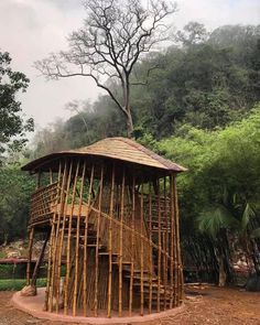 a wooden structure made out of bamboo sticks