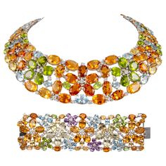 Statement mixed color stone with diamond necklace and bracelet set. By Alexander Beverly Hills. 304.87 carats total gemstone weight. Necklace 166.33 carats total gemstone weight. 154.51 carats of heliodor beryl, peridot, and aquamarine. 179 round brilliant diamonds, 11.82 carats. Approximately G/H color grade and SI clarity grade. 18-karat white gold, 16 inches. Bracelet 138.54 carats total gemstone weight. 128.00 carats of heliodor beryl, peridot, amethyst and aquamarine. 98 round brilliant diamonds, 10.54 carats. Approximately G/H color grade and SI clarity grade. 18-karat white gold, 7 inches. Willing to sell necklace or bracelet separately. Accommodated with an up-to-date digital appraisal by a GIA G.G. once purchased, upon request. Please contact us with any questions. Item Number N59 Art Deco Pendant Necklace, Colored Diamond Jewelry, Bezel Set Necklace, Funny Jewelry, Diamond Chain Necklace, Stone Necklace Set, Fancy Jewellery Designs, Necklace And Bracelet Set, Jewelry Brands