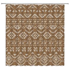 a brown and white shower curtain with geometric designs