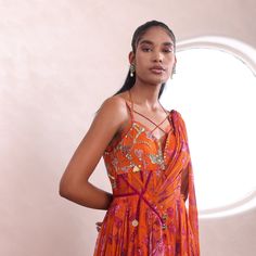 Embroidered Draped Gown From Mahima Mahajan's Fida collection. DELIVERY TIMEPlease allow 6-8 weeks for your outfit to arrive. FABRIC DETAILSLurex Chiffon, Professional cleaning only. Orange Silk Designer Dress, Designer Silk Orange Dress, Orange Cutdana Traditional Drape Dress, Orange Silk Dress For Designer Wear, Orange Traditional Drape Dress For Reception, Orange Embroidered Dress For Reception, Orange Silk Anarkali Dress, Orange Embroidered Dress With Traditional Drape, Orange Embroidered Dresses With Traditional Drape