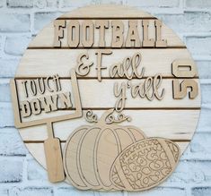 a wooden sign that says football and fall y'all