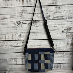 Denim Patchwork Shades of Blue Crossbody Bag With Adjustable Strap Measures approximately 9"Hx13"Wx4"D Adjustable strap 28"-55" This is a lightweight crossbody bag that consists of various denim pieces.  - 1 main zippered section - 1 exterior zippered pocket - Interior slip pockets - Adjustable, removable strap This crossbody bag is ready to be shipped! Denim Blue Crossbody Shoulder Bag For Everyday, Blue Rectangular Satchel With Cell Phone Pocket, Denim Rectangular Satchel For Everyday Use, Denim Crossbody Shoulder Bag For Travel, Denim Blue Crossbody Shoulder Bag For Daily Use, Everyday Denim Rectangular Satchel, Casual Blue Adjustable Bag, Casual Blue Adjustable Bags, Denim Blue Shoulder Bag With Zipper For Everyday Use