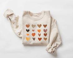 Fall Sweatshirt for Women, Womens Fall Crewneck, Fall Hearts Sweater, Cozy Fall Crewneck, Fall tops, Fall Shirt, Autumn Apparel   SIZE AND FIT: Your sweatshirt design will be printed on a high-quality, soft and comfortable unisex sweatshirt. Sizes run true to size, which takes the guesswork out of ordering; if you like your sweatshirts loose or oversized, you might want to order a size up and if you'd like a more fitted women's style then order a size down. Sizes range from S - 3X. Please refer Fall Hearts, Occupational Therapy Gifts, Pediatric Physical Therapy, Fall Crewneck, Fall Sweaters For Women, Fall Tops, Heart Sweatshirt, Heart Sweater, Sweatshirt For Women