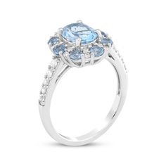 This exquisite and colorful blue topaz ring is one she'll want to wear always. Sterling silver A cool oval-cut Swiss blue topaz is the stunning focal point Round-cut Swiss blue topaz stones and white lab-created sapphires halo the center More white lab-created sapphires shimmer on the shank for all-over sparkle Fine Jewelry Oval Blue Topaz Diamond Ring, Oval Topaz Ring With Diamond And Gemstone Accents, Oval Brilliant Cut Topaz Ring, Fine Jewelry Blue Topaz Diamond Ring, Oval Topaz Ring With Aquamarine And Gemstone Accents, Oval Blue Topaz Diamond Ring With Brilliant Cut, Oval Blue Topaz Halo Jewelry, Oval Topaz Ring With Gemstone Accents, Oval Blue Topaz Diamond Ring