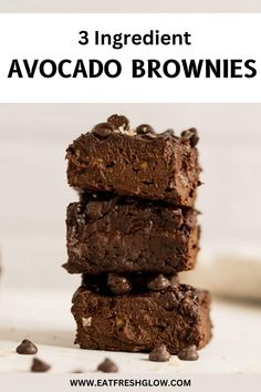 three ingredient chocolate brownies stacked on top of each other with text overlay reading 3 ingredient avocado brownies