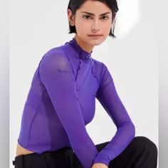 Dark Purple Out From Under Long Sleeve Sheer Mesh Mock Neck Top Never Worn Purple Stretch Crew Neck Top, Trendy Purple Long Sleeve Tops, Purple Long Sleeve Trendy Tops, Trendy Long Sleeve Purple Top, Purple Crew Neck Top For Layering, Purple Fitted Sporty Tops, Lavender Tops For Spring Layering, Trendy Purple Workout Tops, Fitted Purple Long Sleeve Tops