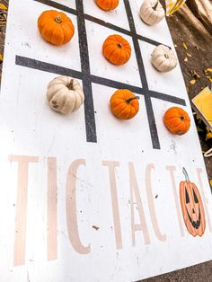 a tic tac toe board with pumpkins on it