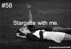 a man and woman laying on the ground with their arms up in the air, texting stargaze with me