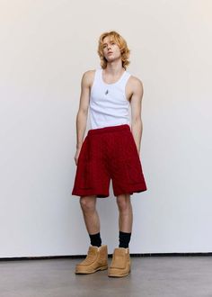 Chunky cable-knit shorts with patch pocket detailing an hidden elasticated waist and a relaxed fit.    wool blend    model wears a size Crochet Boxers Men, Boxers Men, Mens Shoes Sandals, Mens Boxers, Jw Anderson, Red Wool, Designer Clothes For Men, Knit Shorts, Curb Chain