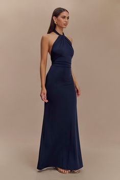 For the perfect guestThe ELYNA Slinky Halter Maxi Dress is the epitome of elegance and allure. Its halter neckline and ruched centre front exude sophistication, while the low back adds a touch of sultry charm. With ruched centre back detail, this dress offers a flattering silhouette from every angle. Designed to hug your curves, its bodycon fit accentuates your figure effortlessly. Perfect for any special occasion, the maxi length adds drama and elegance to your ensemble. Embrace timeless style Outfits Moodboard, Workwear Capsule Wardrobe, European Summer Outfits, Maxi Dress Sale, Halter Maxi Dress, Capsule Outfits, Maxi Dress Navy, Halter Maxi, Beige Dresses