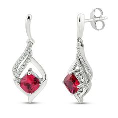 These gorgeous earrings for her feature cushion-cut lab-created rubies set in classic sterling silver. Swirls of round-cut white lab-created sapphires shimmer above to finish the look. The earrings secure with friction backs. Sterling Silver Jewelry With Cushion Cut Gemstone Accents, Classic Gemstone Accented Drop Earrings, White Gold Cushion Cut Jewelry With Gemstone Accents, Anniversary Lab-created Ruby Cushion Cut Jewelry, Elegant Jewelry With Lab-created Ruby Gemstone, Fine Ruby Drop Earrings Jewelry, Fine Ruby Drop Earrings, Wedding Earrings With Lab-created Ruby Gemstone, Elegant Gemstone Earrings With Lab-created Ruby