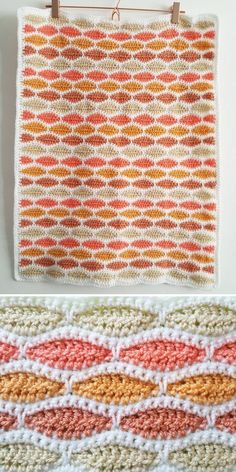 crocheted dishcloths are hanging on the wall and one is made with yarn