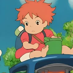 a young boy sitting on the back of a car with an orange hair and red eyes