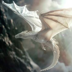 a white dragon flying through the air