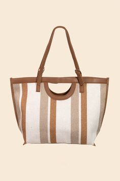 A classic stunning flashy trending must have tote bag that features a unique striped faux leather trim tote bag design. A must have in season accessory for this Spring season! Length: 18 Inches Width: 5 Inches Height: 20 Inches 80%POLYESTER 10%PU 10%ALLOY Online Clothing Boutiques, Women Helping Women, Bag Design, Spring Season, Tote Bag Design, Leather Trim, Boutique Clothing, Leather Trims, Bags Designer