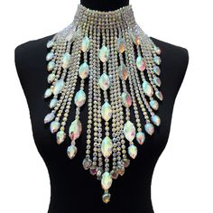 Level up your festival vibes with our Dazzling Crystal long irregular Tassel Necklace for Women. This stunning choker jewelry, bedecked with Shiny Glass Rhinestones, shimmers with a kaleidoscope of colors as you groove the night away. Crafted for both durability and flexibility, it's the ideal accessory to amp up your festival, concert, or special event style. Don't miss out on this mesmerizing festival must-have – grab yours today and dive into the festival magic! Rhinestone Statement Necklace, Choker Jewelry, Womens Chokers, Wedding Accessory, Party Necklace, Rhinestone Choker, Dress Belt, Rhinestone Wedding, Crystal Ab