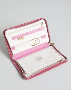 Slip this easy to pack, tangle-free jewelry solution into your suitcase or duffle! Our Embroidered Jewelry Travel Portfolio is lined with soft faux suede to protect your jewelry collection, this case features Spartina gold tone hardware and organized spaces for rings, earrings, and necklaces. Full zip closure with golden mermaid logo stud & zipper pullEmbroidered velvetEasy-to-clean, travel friendly materialsInterior features: zipper pocket, earring holder, middle zipper pocket, additional stora Travel Portfolio, Organized Spaces, Embroidered Jewelry, Spartina 449, Jewelry Travel, Earring Holder, Travel Jewelry, Free Jewelry, Luxury Handbags