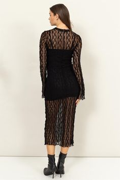 Sheer Elegance Black Lace Midi Dress TURN HEADS IN THIS LONG-SLEEVE LACE MIDI DRESS, FEATURING SHEER DETAILING AND A HIGH NECK. THE INTRICATE LACE DESIGN AND MIDI LENGTH OFFER A BLEND OF ELEGANCE AND SOPHISTICATION, MAKING IT PERFECT FOR FORMAL EVENTS OR A NIGHT OUT. PAIR IT WITH BOOTS AND MINIMAL ACCESSORIES TO COMPLETE THE LOOK.MODEL IS 5' 7" TALL, 32" CHEST, 25" WAIST AND 35" HIPS AND WEARING A SIZE SMALL Black Fitted Lace Mesh Dress, Sheer Long Sleeve Lace Dress For Night Out, Sheer Long Sleeve Lace Dress For Date Night, Long Sleeve Sheer Lace Dress For Date Night, Black Lace Midi Dress With Sheer Details, Black Lace Mesh Dress For Spring, Black Long Sleeve Lace Maxi Dress, Black Lace Midi Dress With Sheer Sleeves, Black Sheer Long Sleeve Maxi Dress