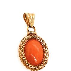 A magnificent vintage coral pendant with a genuine pinkish orangy tone. The Pendant does not come with the chain. Formal Orange Cabochon Necklace, Antique Oval Orange Jewelry, Orange Oval Antique Jewelry, Antique Orange Oval Jewelry, Oval Orange Cabochon Jewelry, Vintage Oval Coral Jewelry, Oval Coral Cabochon Jewelry, Coral Oval Cabochon Jewelry, Vintage Coral Oval Jewelry