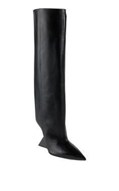 Set on a daring, notched wedge heel, these pull-on boots exude a modern edge. They are crafted of a rich leather with a pointed toe and wide-set tubular shaft.Point toeWedge heelSlip-onComposition: 100% CalfUpper: Leather; Lining: Leather; Sole: LeatherWedge heel height: 4.1"Fits true to sizeMade in Italy Chic Pointed Toe Calf Leather Wedge Boots, Chic Calf Leather Wedge Boots With Pointed Toe, Modern Pointed Toe Wedge Boots For Fall, Chic Leather Wedge Heeled Boots, Modern Wedge Heel Boots For Formal Occasions, Chic Pointed Toe Wedge Boots For Formal Occasions, Chic Formal Wedge Boots With Pointed Toe, Leather Wedge Boots With Pointed Toe For Evening, Chic Pointed Toe Wedge Boots For Work