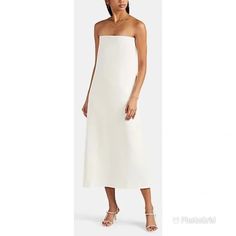 The Row | Dresses | The Row Sleeveless Stretch Cady Long Dress In Ivory Zip Closure At Side | Poshmark Formal Sleeveless Off-white Maxi Dress, Formal Off-white Sleeveless Maxi Dress, Formal Sleeveless Off White Maxi Dress, Off White Sleeveless Maxi Dress For Formal Events, Off White Sleeveless Evening Midi Dress, Off White Sleeveless Midi Dress For Evening, Elegant Strapless Midi Daywear Dress, White Silk Strapless Dress For Formal Occasions, Formal White Silk Strapless Dress