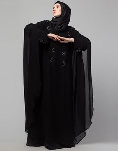 Black Shine Nida Black Embroidery Abaya for Party very comfortable and easy to wear fit for all daily wear Abaya Back close with loop, button & zip, easy to wear Dress belongs to the embroidery work with glass stone at the front and sleeves Hijab and band shown in the image can be bought separately Fabric: PartyCare: Mild machine wash/ hand Cold Wash/Dry cleanWe request customers to carefully choose the correct size and dress length referring to our size chart Black Long Khimar For Eid, Black Khimar For Eid, Black Long Sleeve Khimar For Eid, Long Sleeve Black Khimar For Eid, Black Long Sleeve Hijab For Eid, Traditional Black Dabka Khimar, Black Floor-length Abaya With Dabka Work, Black Long Sleeve Khimar With Dabka, Long Black Abaya For Eid