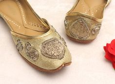 * Bridal wedding gold heart flat shoes as shown above. * comfortable in wear. * Perfect for every occasion. * best in quality. * Handmade by me. Please chose your size from the below chat. If you are not sure about your size, please let us know.We ll help you out. Sizes: - US 4.5 - EU 34 - 22.5 cms - US 5 - EU 35- 23cms - US 6 - EU 36- 23.5 cms - US 7- EU 37- 24 cms - US 7.5- EU 38- 24.5 cms - US 8.5- EU 39- 25 cms - US 9- EU 40- 25.5 cms - US 10- EU 41- 26 cms - US 11- EU 42- 26.5 cms ** Standa Wedding Slip-on Flats For Festivals, Gold Flat Wedding Shoes For Party, Gold Flat Heel Wedding Shoes, Gold Round Toe Flats For Party, Gold Flats With Round Toe For Party, Gold Almond Toe Flats For Party, Gold Almond Toe Party Flats, Wedding Flats With Zari Work And Round Toe, Wedding Flats With Gota Work And Round Toe