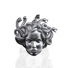 the head of a woman with snakes in her hair