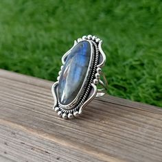 NOTE : WE USED NATURAL GEMSTONES , SO STONE MAY BE LITTLE DIFFERENT .This is a listing of Boho sterling silver ring # metal = sterling silver 925 # Gemstone - Labradorite # Ring Size - Available in all Size # Stone Color - Blue # Stone Shape - Oval Handmade Crafting bohemian Ring - This style has bohemian style . it will look beautiful when you wear it .. Thanks for visiting our shop ... favorite our shop for daily updates ... Bohemian Style Labradorite Open Ring, Bohemian Labradorite Open Ring, Silver Bohemian Labradorite Ring, Silver Labradorite Bohemian Ring, Bohemian Silver Labradorite Ring, Stone Ring Design, Fire Ring, Handmade Clay Jewelry, Big Rings